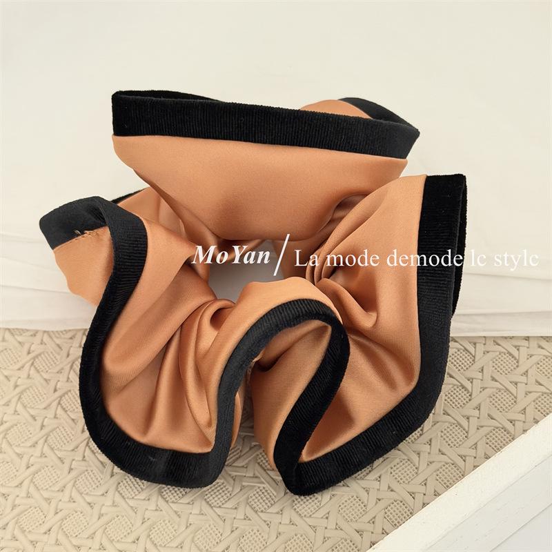 Элегантная атласная черная резинка для волос в корейском стиле для хвостиков и пучков
Элегантная атласная черная резинка для волос в корейском стиле для хвостиков и пучков