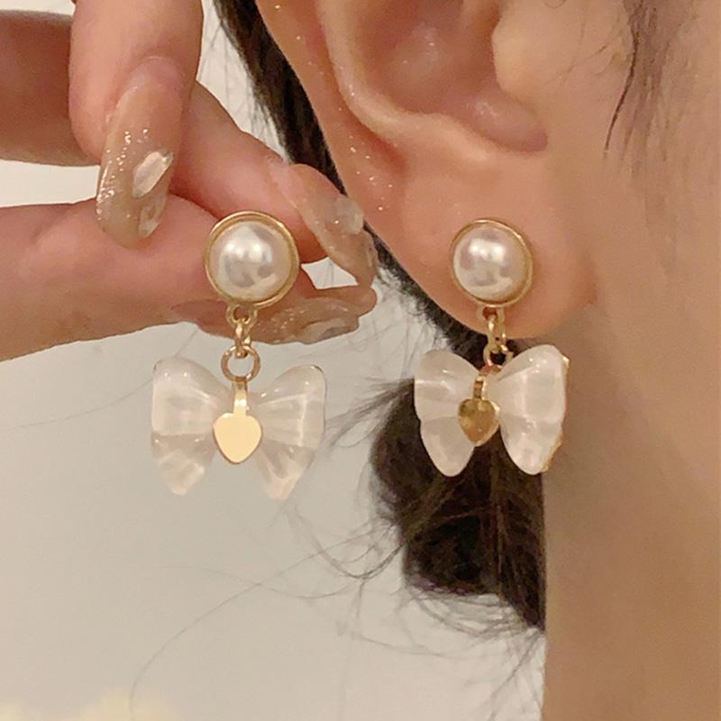 Новые изысканные японские и корейские новые серьги «Любовь» с французским бантом
Новые изысканные японские и корейские новые серьги «Любовь» с французским бантом