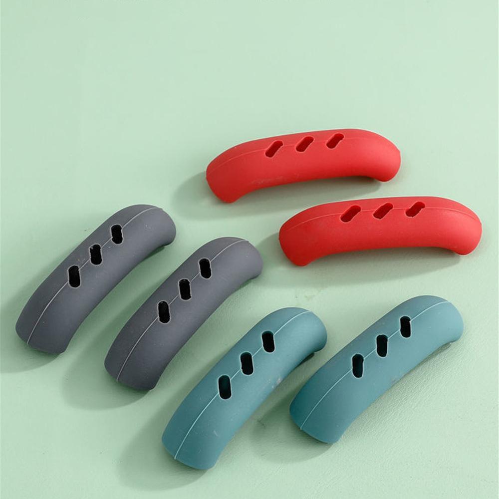 Silicone Pot Handle Cover Heat Insulation Covers Pot Ear Clip Steamer Casserole Pan Handle Holder Non-slip Kitchen Tool
Silicone Pot Handle Cover Heat Insulation Covers Pot Ear Clip Steamer Casserole Pan Handle Holder Non-slip Kitchen Tool