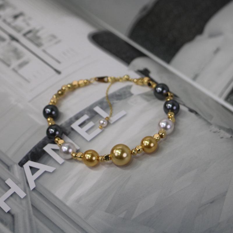 Meillard Spring/Summer Butterfly Pearl Bracelet: Mixed Color Gold Beads, Vintage Light Luxury Design
Meillard Spring/Summer Butterfly Pearl Bracelet: Mixed Color Gold Beads, Vintage Light Luxury Design