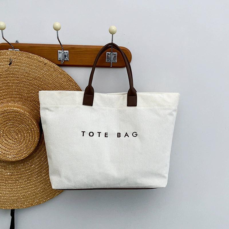Corduroy Tote Bag with Letter Design Large Capacity Shoulder Bag for Work & Daily Use білий
Corduroy Tote Bag with Letter Design Large Capacity Shoulder Bag for Work & Daily Use білий