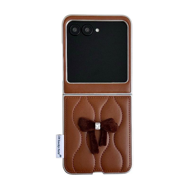 Fashionable Bowknot Motorola Razr60 Drop-proof Foldable Phone Case with Anti-lost Rope. Motorola razr60/50
Fashionable Bowknot Motorola Razr60 Drop-proof Foldable Phone Case with Anti-lost Rope. Motorola razr60/50