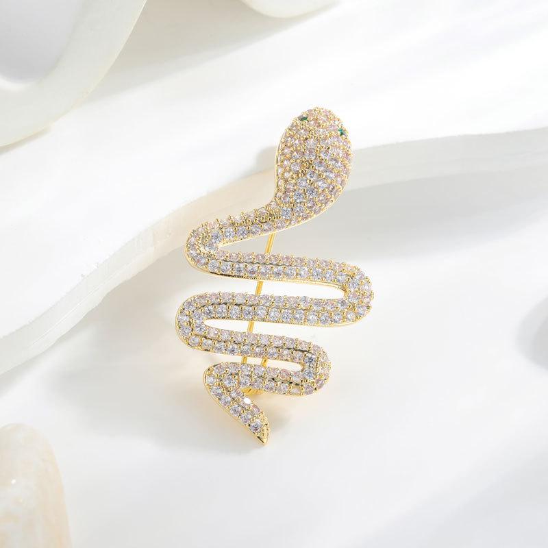 Брошь Chic Snake — модный, роскошный аксессуар в виде змеи
Брошь Chic Snake — модный, роскошный аксессуар в виде змеи