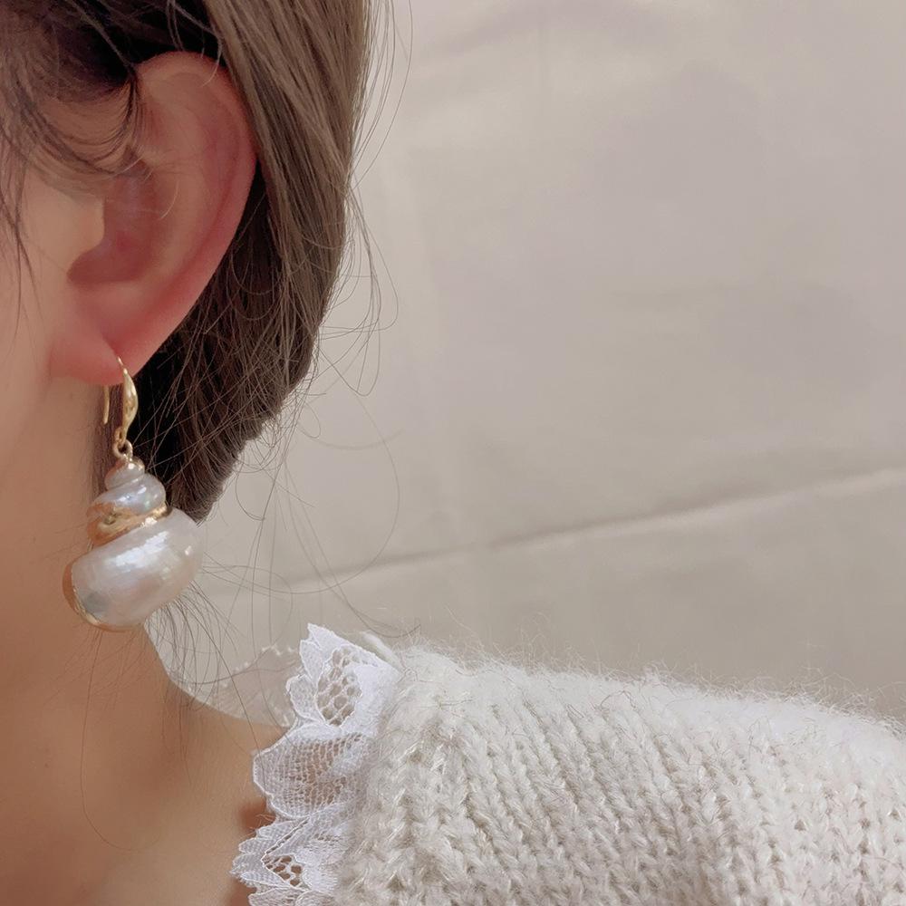 Элегантные серьги-кисточки в виде ракушек в стиле барокко для женщин
Элегантные серьги-кисточки в виде ракушек в стиле барокко для женщин