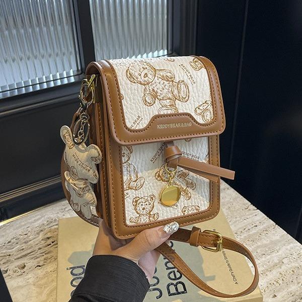 Mobile phone bag female messenger 2025 new fashion niche design single shoulder small square bag for mobile phones
Mobile phone bag female messenger 2025 new fashion niche design single shoulder small square bag for mobile phones
