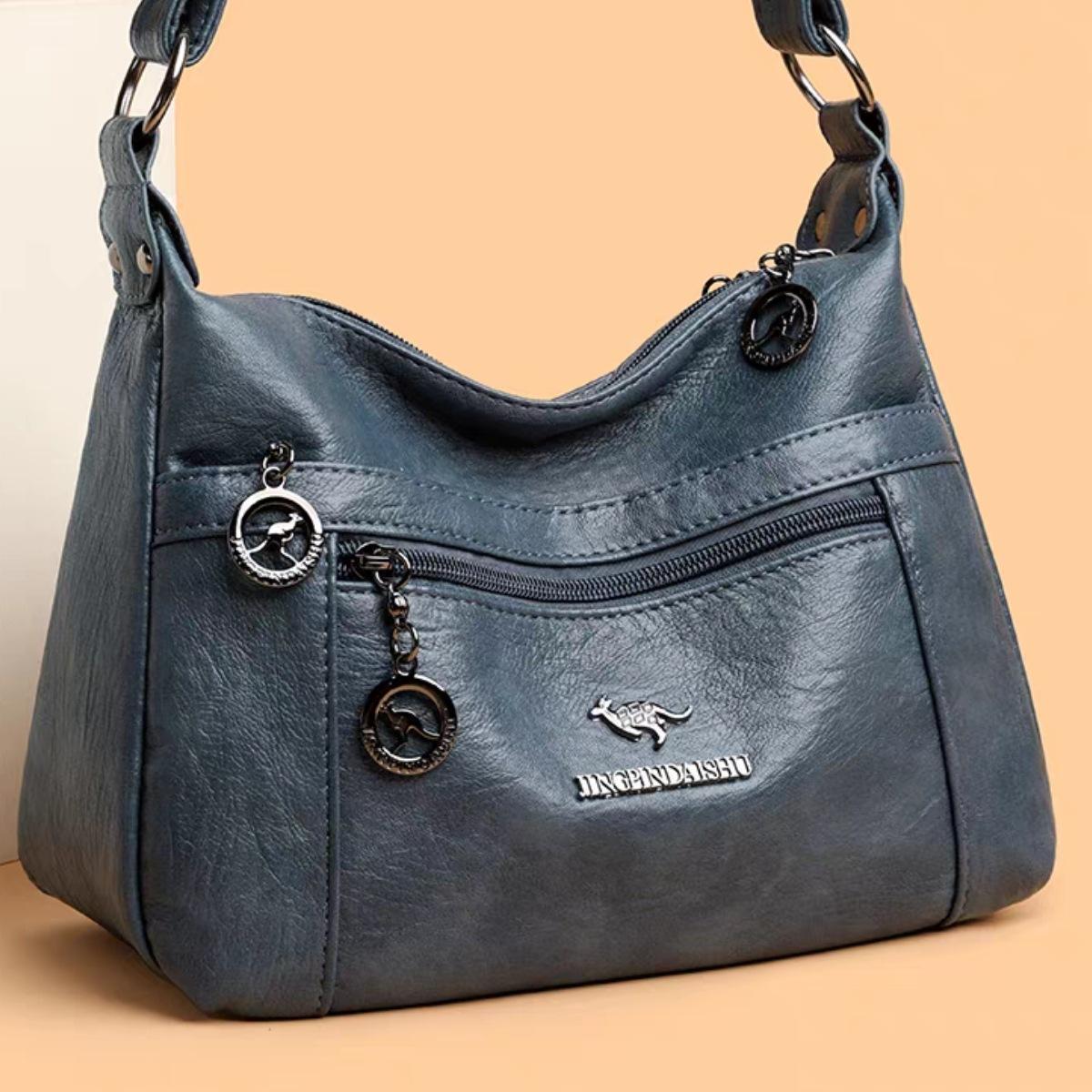 Soft Leather Women s Bag Cross-body Large-capacity Mother Middle-aged Elderly Single Shoulder Multi-function Backpack 25x12x22 синій
Soft Leather Women s Bag Cross-body Large-capacity Mother Middle-aged Elderly Single Shoulder Multi-function Backpack 25x12x22 синій