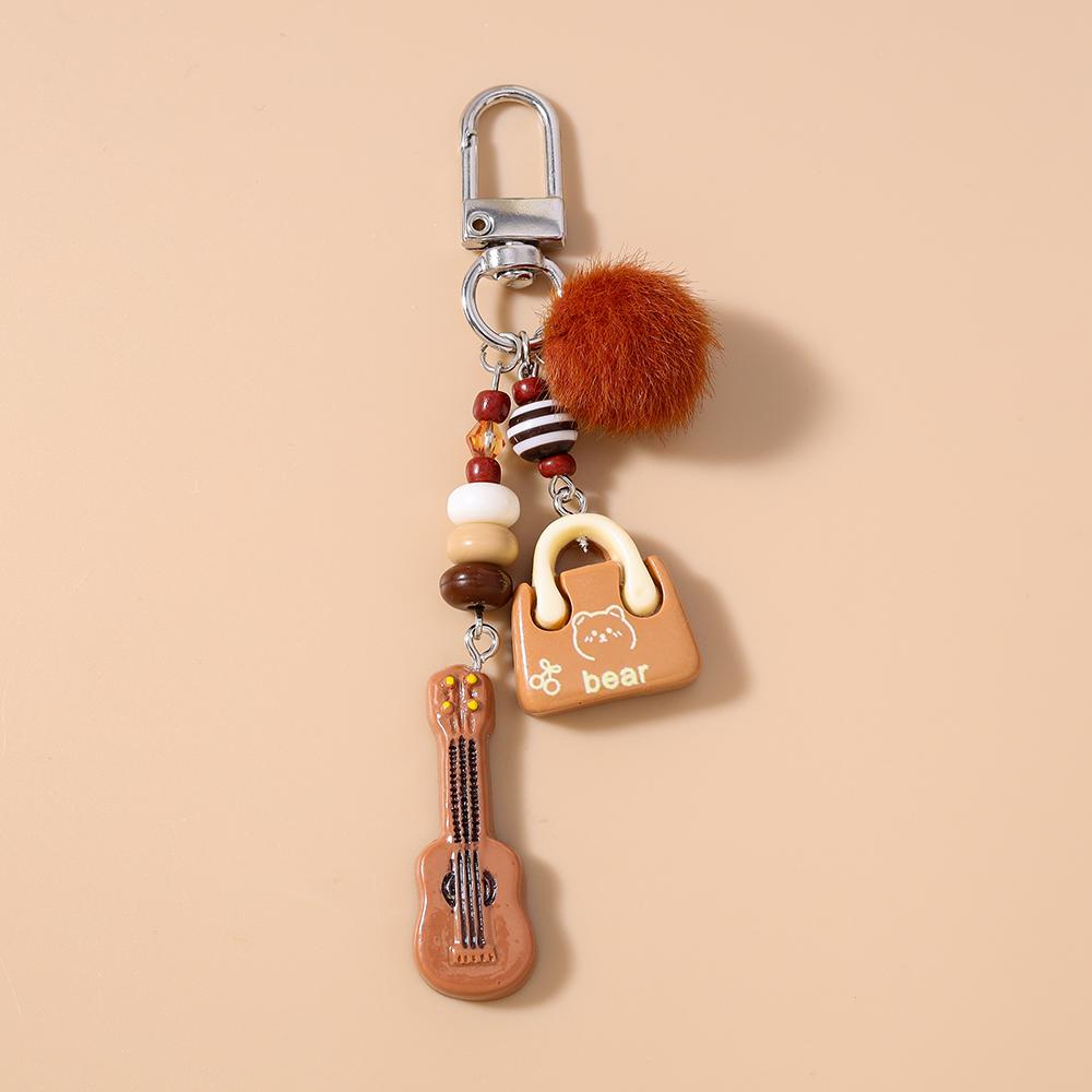 New Resin Simulation Guitar Keychain Fluffy Ball Key Ring Pendant for Women Girls Handbag Decor DIY Key Chain Jewelry Gift
New Resin Simulation Guitar Keychain Fluffy Ball Key Ring Pendant for Women Girls Handbag Decor DIY Key Chain Jewelry Gift
