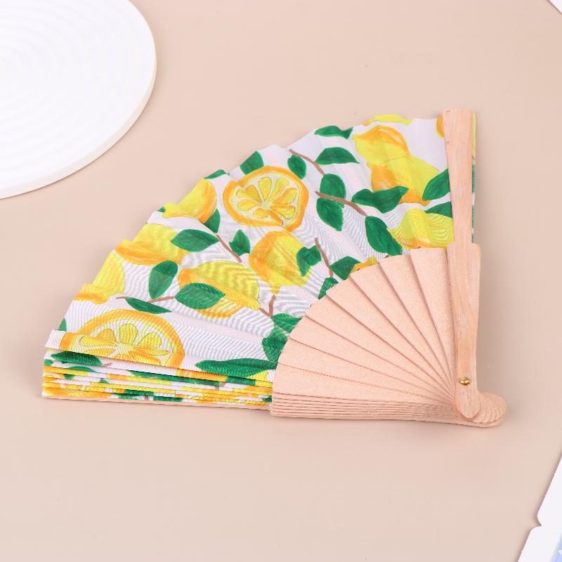 Lemon Print Folding Hand Fan Fruit Pattern Bamboo Fabric Handheld Fan For Summer Cooling Dance Performance Wedding Party Decor 1pcs
Lemon Print Folding Hand Fan Fruit Pattern Bamboo Fabric Handheld Fan For Summer Cooling Dance Performance Wedding Party Decor 1pcs