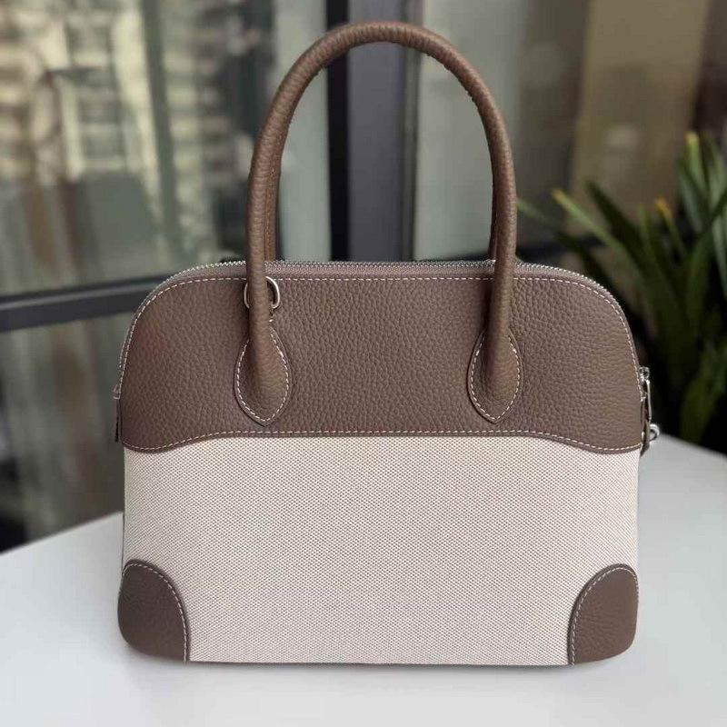 2025 Нова Жіноча Сумка з Натуральної Шкіри Шкіра Головного Шару з Полотном 31 Сумка-Боулінг Сумка-Раковина Ручна Одноплечова Діагональна 31x14x23cm чорний
2025 Нова Жіноча Сумка з Натуральної Шкіри Шкіра Головного Шару з Полотном 31 Сумка-Боулінг Сумка-Раковина Ручна Одноплечова Діагональна 31x14x23cm чорний