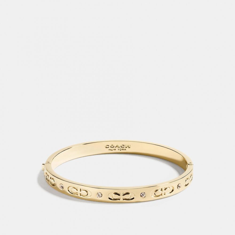Браслет Coach Signature на шарнире
Браслет Coach Signature на шарнире