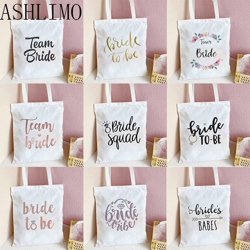 Подружка невесты Tote Bag Team Bride To Be Tote Персонализированная сумка подружки невесты Сумочка Свадебная вечеринка Подружки невесты Подарки Свадьба Невеста Tote
Подружка невесты Tote Bag Team Bride To Be Tote Персонализированная сумка подружки невесты Сумочка Свадебная вечеринка Подружки невесты Подарки Свадьба Невеста Tote