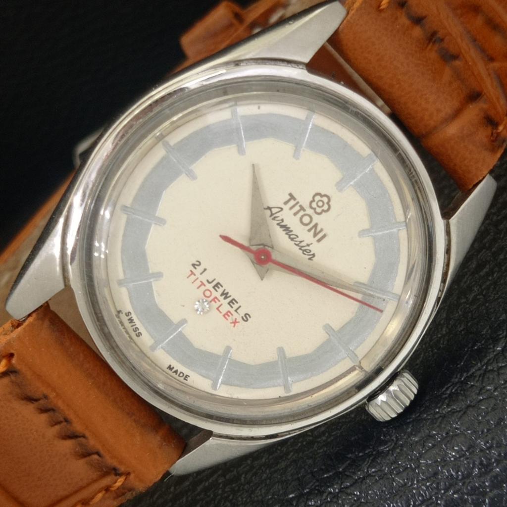 TITONI AIRMASTER TITOFLEX VINTAGE HAND-WINDING SWISS MENS WHITE WATCH a703216-1 R213a-a703216
TITONI AIRMASTER TITOFLEX VINTAGE HAND-WINDING SWISS MENS WHITE WATCH a703216-1 R213a-a703216