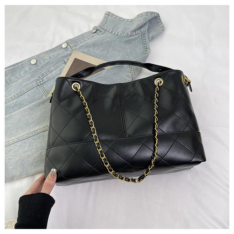 2025 new Xiaoxiangfeng rhombus chain retro wandering color matching shopping bag tote bag large-capacity shoulder messenger bag чорний
2025 new Xiaoxiangfeng rhombus chain retro wandering color matching shopping bag tote bag large-capacity shoulder messenger bag чорний