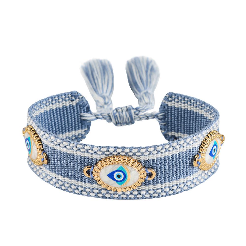 Lucky Evil Eye Tassel Bracelet: Handmade Butterfly & Rivet Design, Woven for Women - European American Style, Personalized Fashion Accessory.
Lucky Evil Eye Tassel Bracelet: Handmade Butterfly & Rivet Design, Woven for Women - European American Style, Personalized Fashion Accessory.