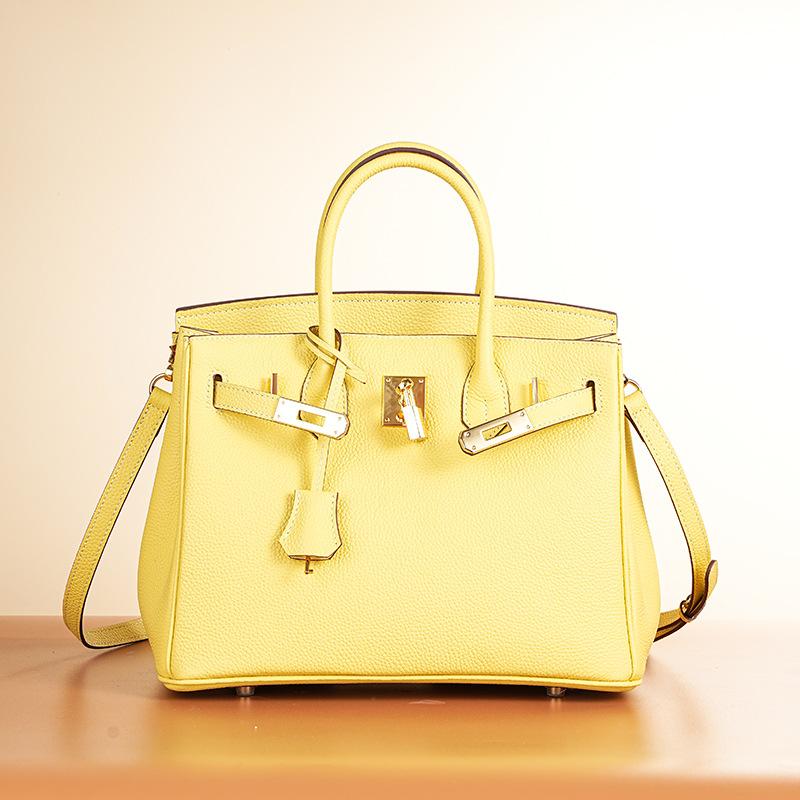 Воскова нитка Того першого шару коров ячої шкіри ручної роботи платинової сумки, висока версія шкіряної жіночої сумки з замком темпераменту повсякденна сумка 30cm
Воскова нитка Того першого шару коров ячої шкіри ручної роботи платинової сумки, висока версія шкіряної жіночої сумки з замком темпераменту повсякденна сумка 30cm