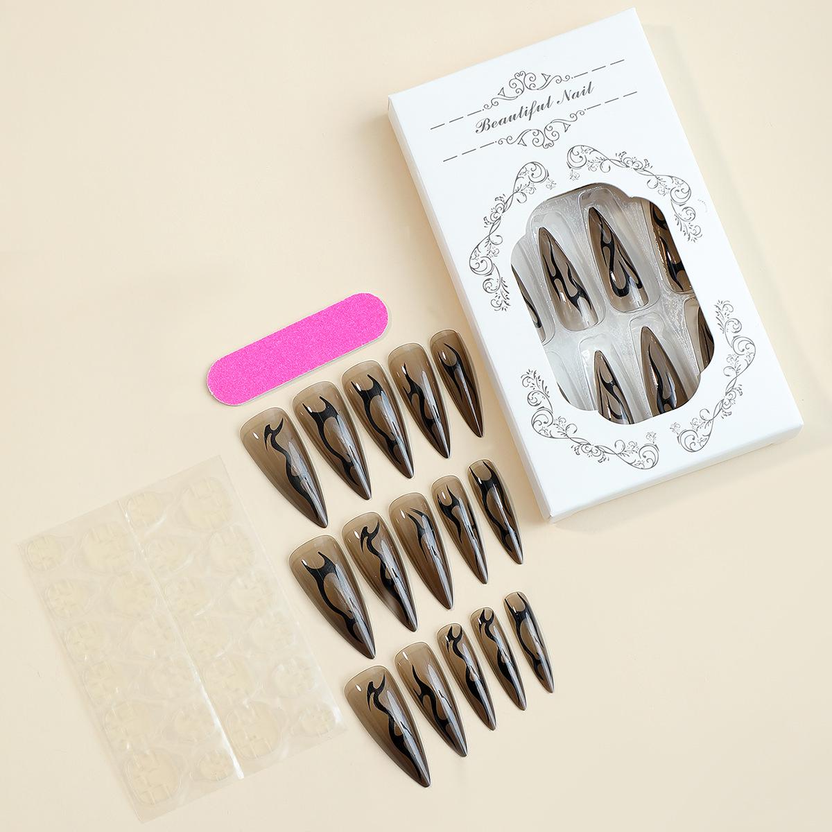 Высококачественные накладные ногти острой формы с темными цветами и нерегулярными полосками пламени
Высококачественные накладные ногти острой формы с темными цветами и нерегулярными полосками пламени