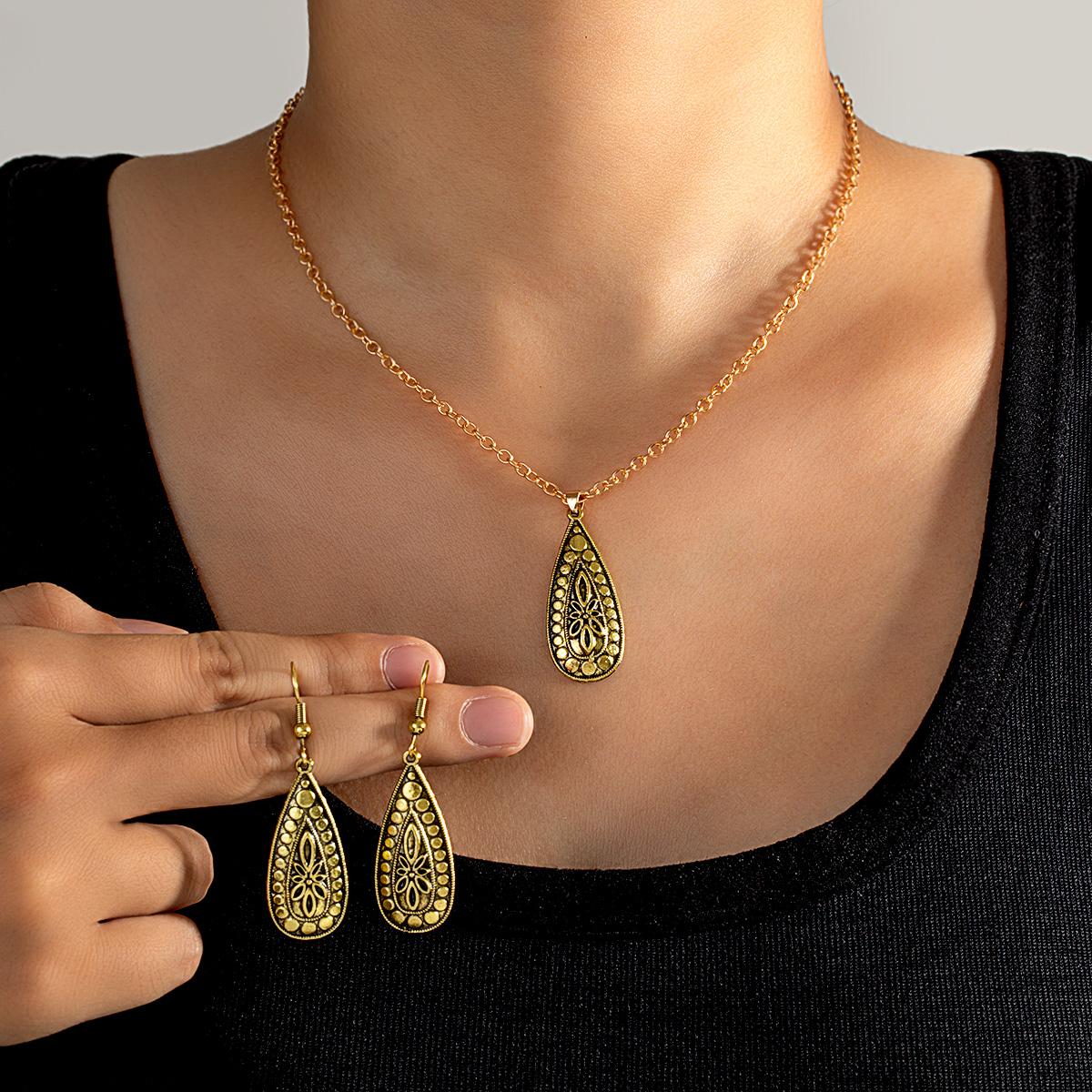 2-piece fashionable retro water droplet pattern pendant geometric necklace earrings versatile women s jewelry set
2-piece fashionable retro water droplet pattern pendant geometric necklace earrings versatile women s jewelry set