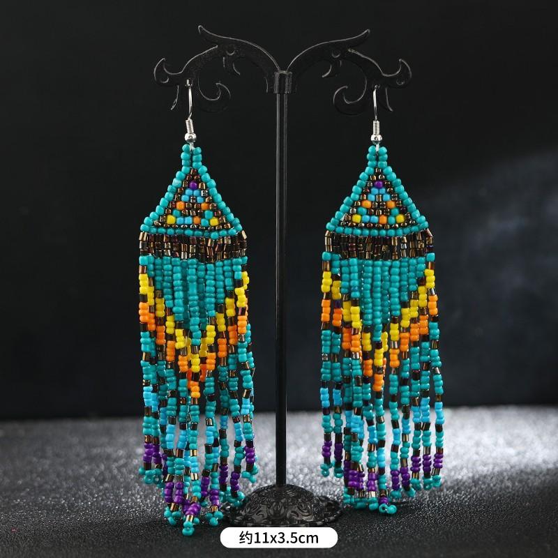 Плетеные вручную богемные серьги, серьги с бахромой из длинных рисовых бусин, женские серьги с характером и темпераментом.
Плетеные вручную богемные серьги, серьги с бахромой из длинных рисовых бусин, женские серьги с характером и темпераментом.