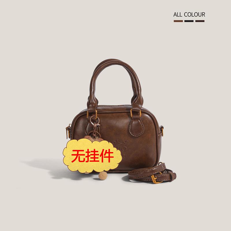 High-end small bag women s new autumn and winter popular versatile messenger bag portable bowling bag коричневий
High-end small bag women s new autumn and winter popular versatile messenger bag portable bowling bag коричневий