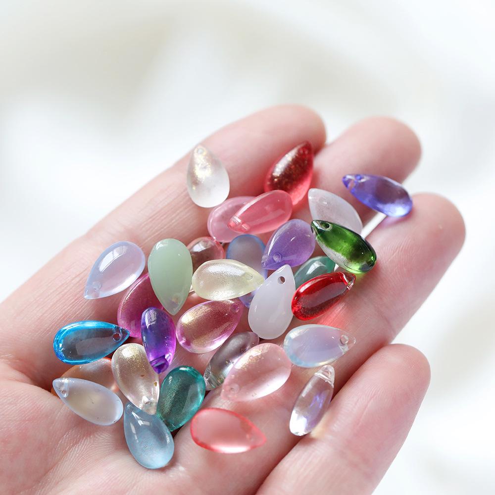 8x14mm Transparent Colored Glass Teardrop Pendant Beads for DIY Hairpins, Earrings, and Bracelets 10 pcs/pack, approx. 7.5g
8x14mm Transparent Colored Glass Teardrop Pendant Beads for DIY Hairpins, Earrings, and Bracelets 10 pcs/pack, approx. 7.5g