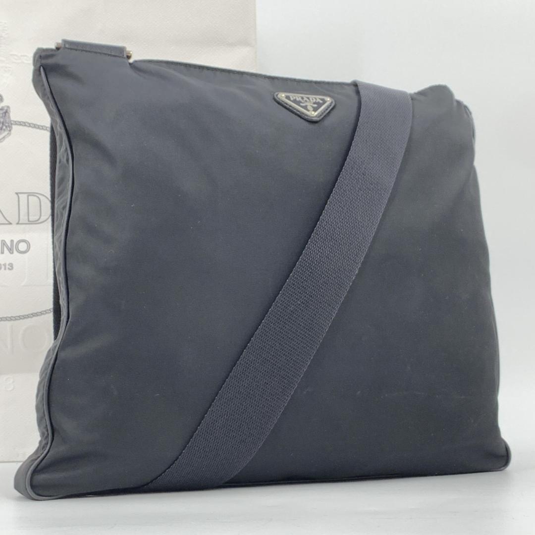 PRADA Shoulder Bag Sacoche Crossbody Tessuto Nylon Saffiano Leather Black Triangle Logo Plate A4 Capacity
PRADA Shoulder Bag Sacoche Crossbody Tessuto Nylon Saffiano Leather Black Triangle Logo Plate A4 Capacity