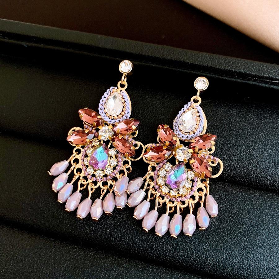 Silver needle retro ethnic style diamond-encrusted water drop glass fringed earrings stud earrings personalized earrings
Silver needle retro ethnic style diamond-encrusted water drop glass fringed earrings stud earrings personalized earrings