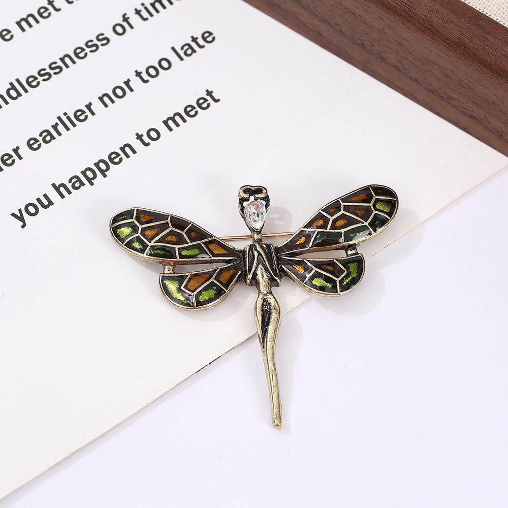 Японська та Корейська Мода Брошка Бабка зі Стразами - Креативна Брошка Комаха зі Сплаву для Універсальних Аксесуарів до Костюма
Японська та Корейська Мода Брошка Бабка зі Стразами - Креативна Брошка Комаха зі Сплаву для Універсальних Аксесуарів до Костюма