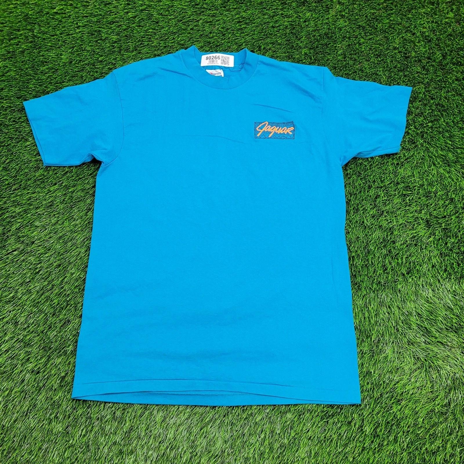 Vintage 80s Hanes Shirt M/L 20x28 Blue Jaguar Aztec Logo 4XL
Vintage 80s Hanes Shirt M/L 20x28 Blue Jaguar Aztec Logo 4XL