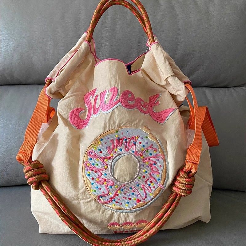 Embroidered Eco-Friendly Nylon Shopping Bag - Versatile Handheld/Shoulder/Crossbody Tote M
Embroidered Eco-Friendly Nylon Shopping Bag - Versatile Handheld/Shoulder/Crossbody Tote M