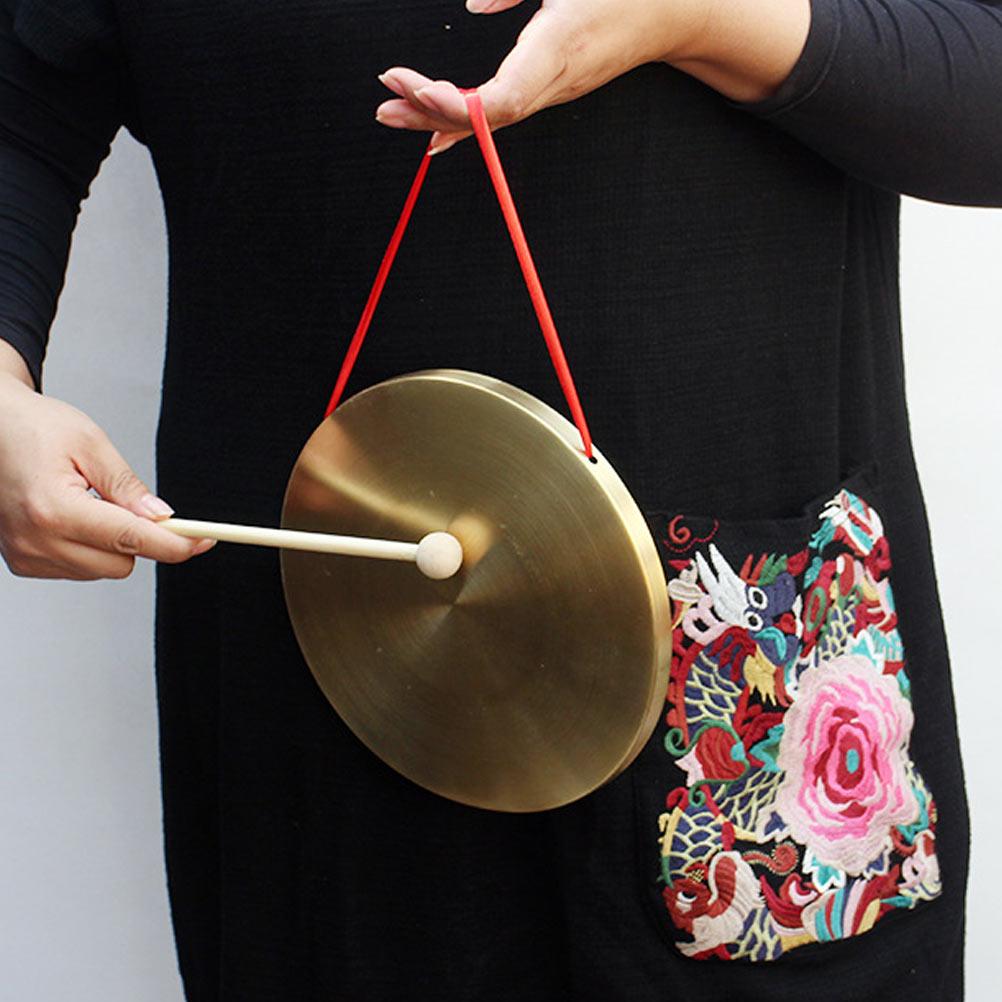 1Set Hand Made Mini Copper Gong Durable Sturdy Pure Sound Loud Resounding Percussion Instrument Hanging Rope Gong Festival
1Set Hand Made Mini Copper Gong Durable Sturdy Pure Sound Loud Resounding Percussion Instrument Hanging Rope Gong Festival