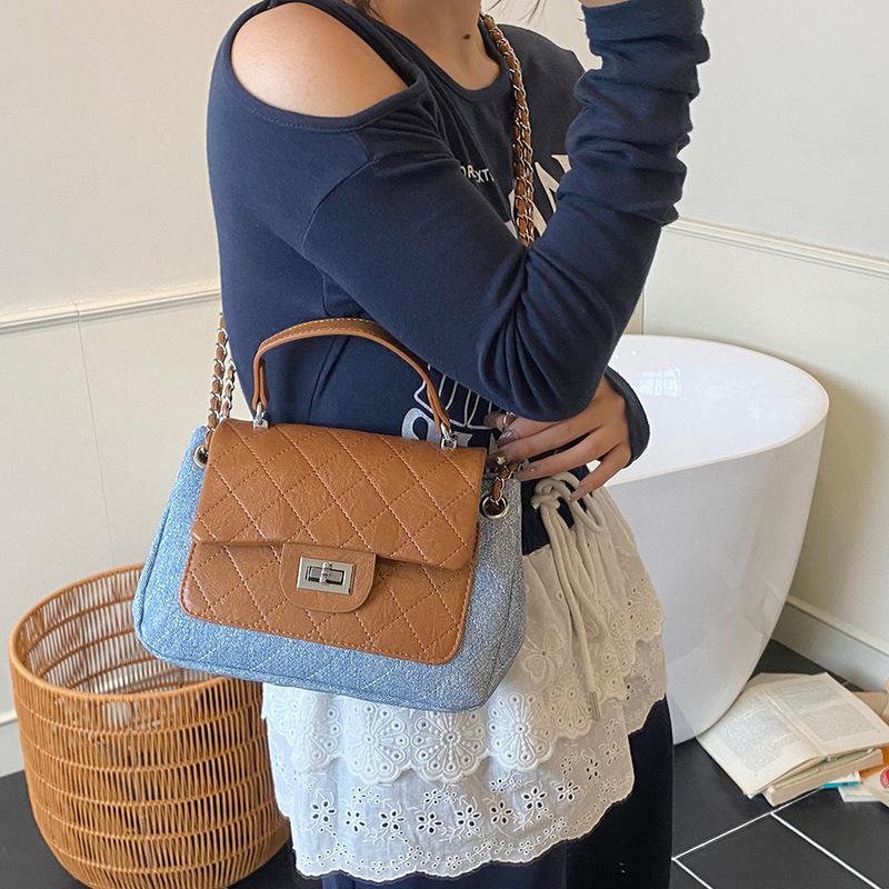 Women s bag summer new popular versatile diamond embroidered thread chain messenger bag fashionable shoulder small square bag темно-синього кольору
Women s bag summer new popular versatile diamond embroidered thread chain messenger bag fashionable shoulder small square bag темно-синього кольору