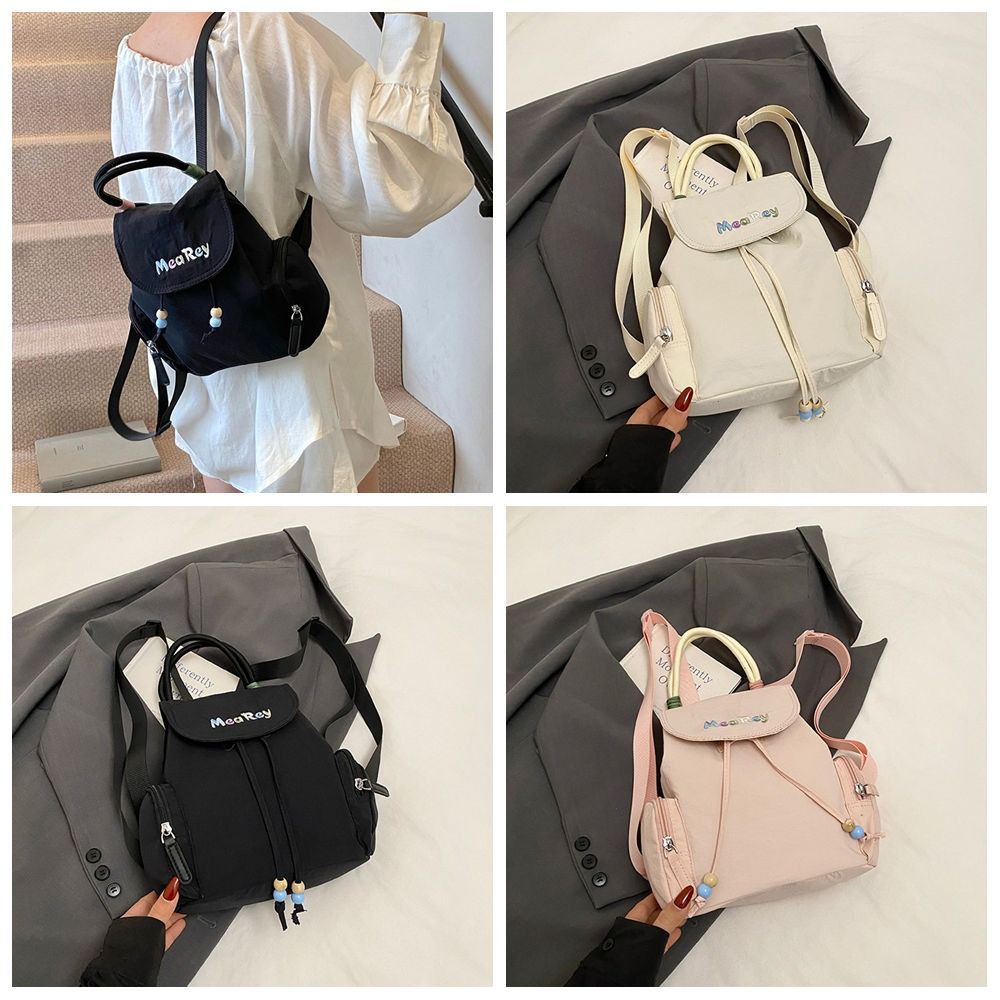 Nylon Drawstring Backpack Letter Embroidery Shoulder Bag Creative Students School Bag Rucksacks білий
Nylon Drawstring Backpack Letter Embroidery Shoulder Bag Creative Students School Bag Rucksacks білий