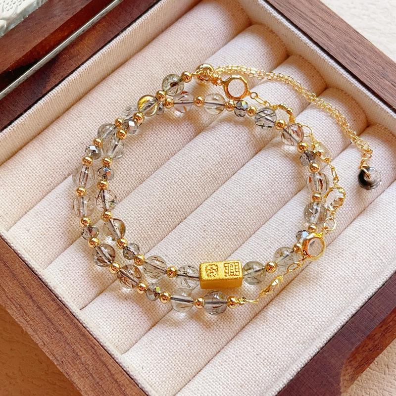 Crystal bracelet men s and women s mica symbiotic double wheel black gold crystal double circle design bracelet bracelet.
Crystal bracelet men s and women s mica symbiotic double wheel black gold crystal double circle design bracelet bracelet.