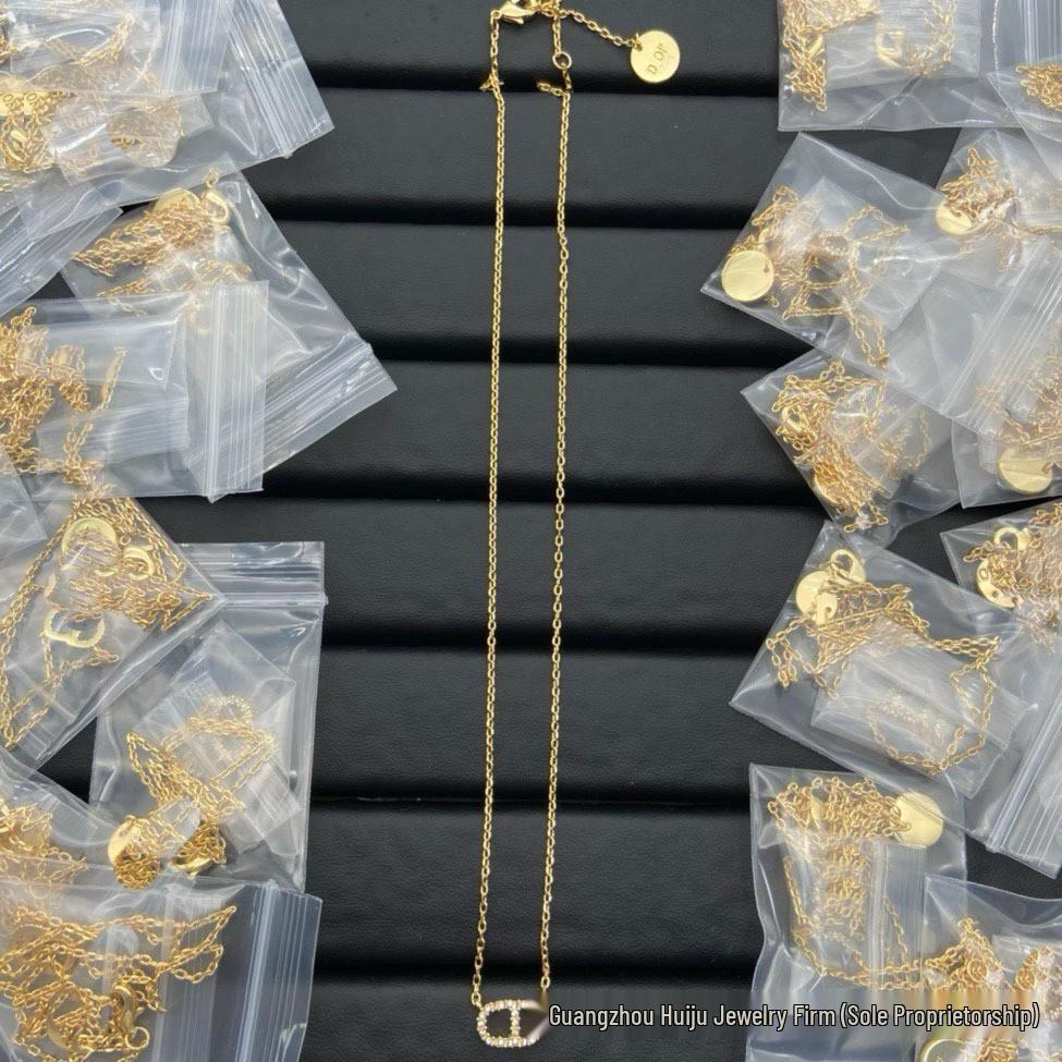 Vintage Diga Necklace: Diamond & Pearl Inlaid CD Letter Clavicle Chain & Sweater Chain for Women
Vintage Diga Necklace: Diamond & Pearl Inlaid CD Letter Clavicle Chain & Sweater Chain for Women