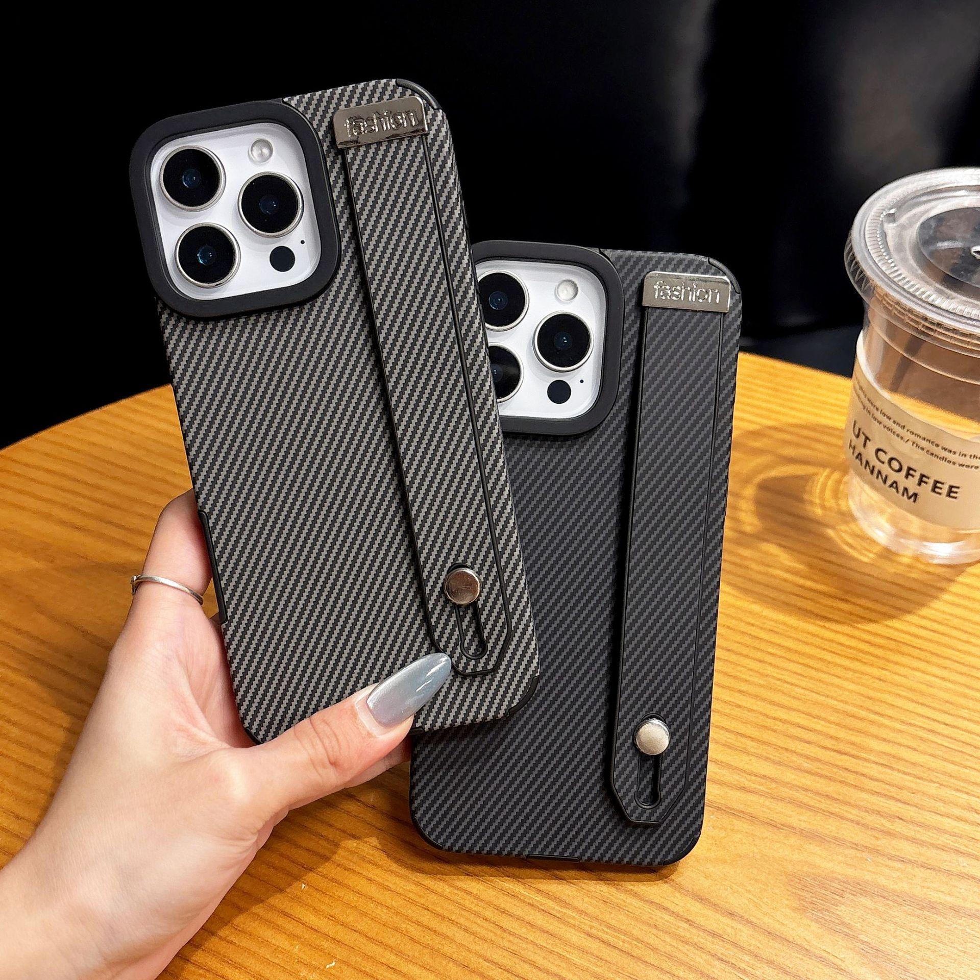 The Carbon Fiber Textured Phone Case Is Suitable for IPhone16promax Wristband Stand and Apple 15 with Built-in Magnetic Case iPhone16
The Carbon Fiber Textured Phone Case Is Suitable for IPhone16promax Wristband Stand and Apple 15 with Built-in Magnetic Case iPhone16