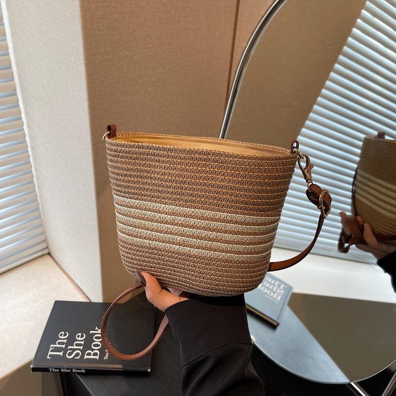 Small bag women s spring and summer new versatile messenger bag woven straw bag highend bucket beach bag
Small bag women s spring and summer new versatile messenger bag woven straw bag highend bucket beach bag