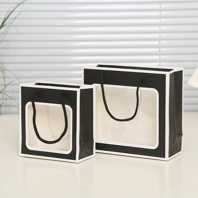 Colorful Window Display Handle Gift Bag for Clothing & Party Favors
Colorful Window Display Handle Gift Bag for Clothing & Party Favors