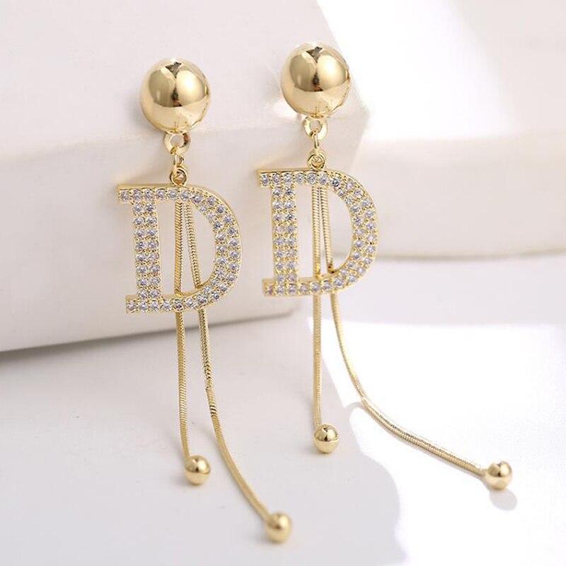 Light luxury letter tassel earrings, fashionable and high-end, versatile and trendy in temperament
Light luxury letter tassel earrings, fashionable and high-end, versatile and trendy in temperament