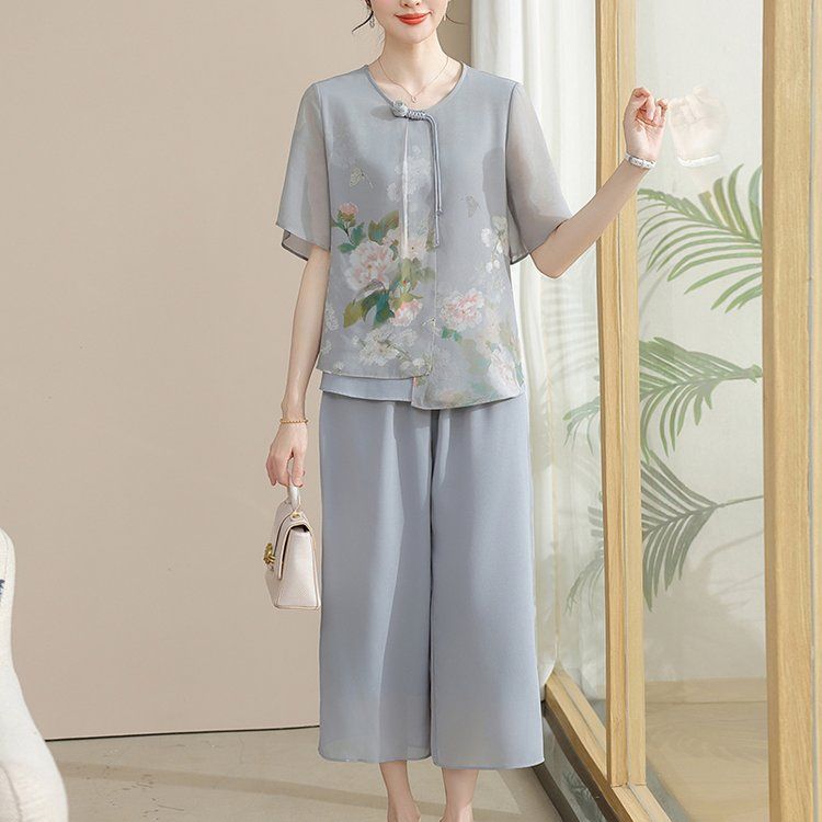 Elegant Middle Aged Women Summer Set Fashionable Chinese Style Chiffon Blouse and Short Sleeve T Shirt XL рожевий
Elegant Middle Aged Women Summer Set Fashionable Chinese Style Chiffon Blouse and Short Sleeve T Shirt XL рожевий