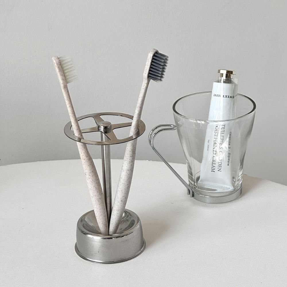 Stainless Steel Toothpaste Stand Holds 4 Standard Brushes Multi-Purpose Storage Shelf Countertops 
Stainless Steel Toothpaste Stand Holds 4 Standard Brushes Multi-Purpose Storage Shelf Countertops