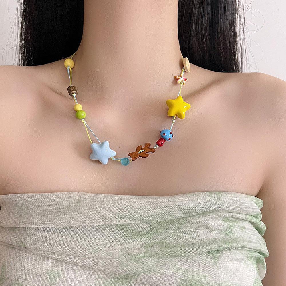 Acrylic star button wood chip bear pendant necklace colored dopamine niche light luxury fashion versatile items
Acrylic star button wood chip bear pendant necklace colored dopamine niche light luxury fashion versatile items