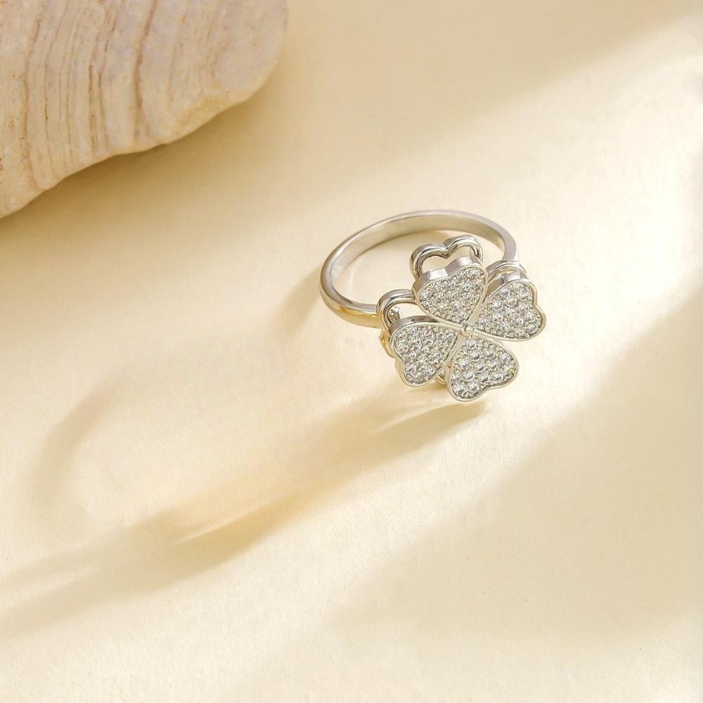 Exquisite Shining Full of Zircon Four-leaf Flower Rotatable Stainless Steel Adjustable Opening Rings for Women Designer Jewelry resizable срібний
Exquisite Shining Full of Zircon Four-leaf Flower Rotatable Stainless Steel Adjustable Opening Rings for Women Designer Jewelry resizable срібний