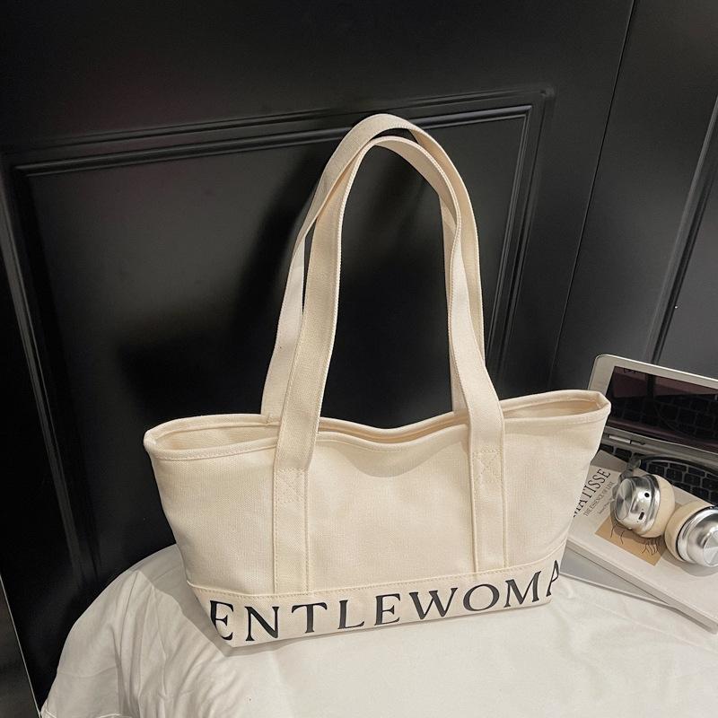 New Fashi Gentlewoman Canvas Shoulder Bag Large Capacity Casual Letter Handle Bag for Women Texture and Versatile Storage Bags білий
New Fashi Gentlewoman Canvas Shoulder Bag Large Capacity Casual Letter Handle Bag for Women Texture and Versatile Storage Bags білий