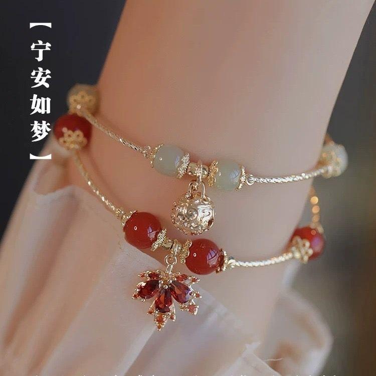 Ning an Rumeng maple leaf girl bell pendant stacked with niche new court design personalized jewelry
Ning an Rumeng maple leaf girl bell pendant stacked with niche new court design personalized jewelry