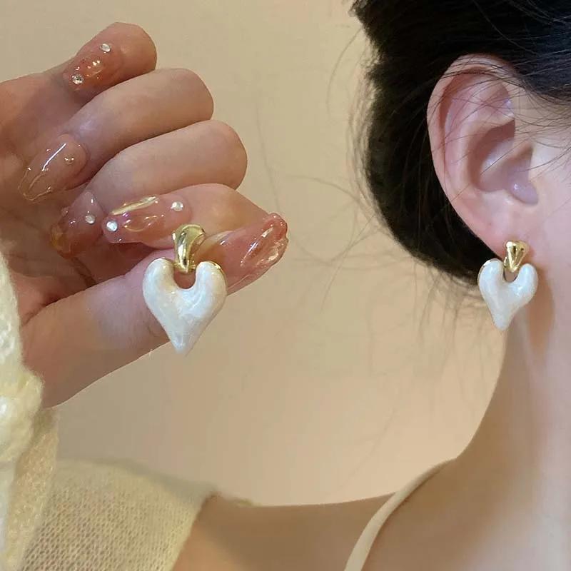 LATS New Design Colorful Love Heart Dangle Earrings for Women Vintage Elegant Irregular Fashion Zircon Accessories Wholesale
LATS New Design Colorful Love Heart Dangle Earrings for Women Vintage Elegant Irregular Fashion Zircon Accessories Wholesale