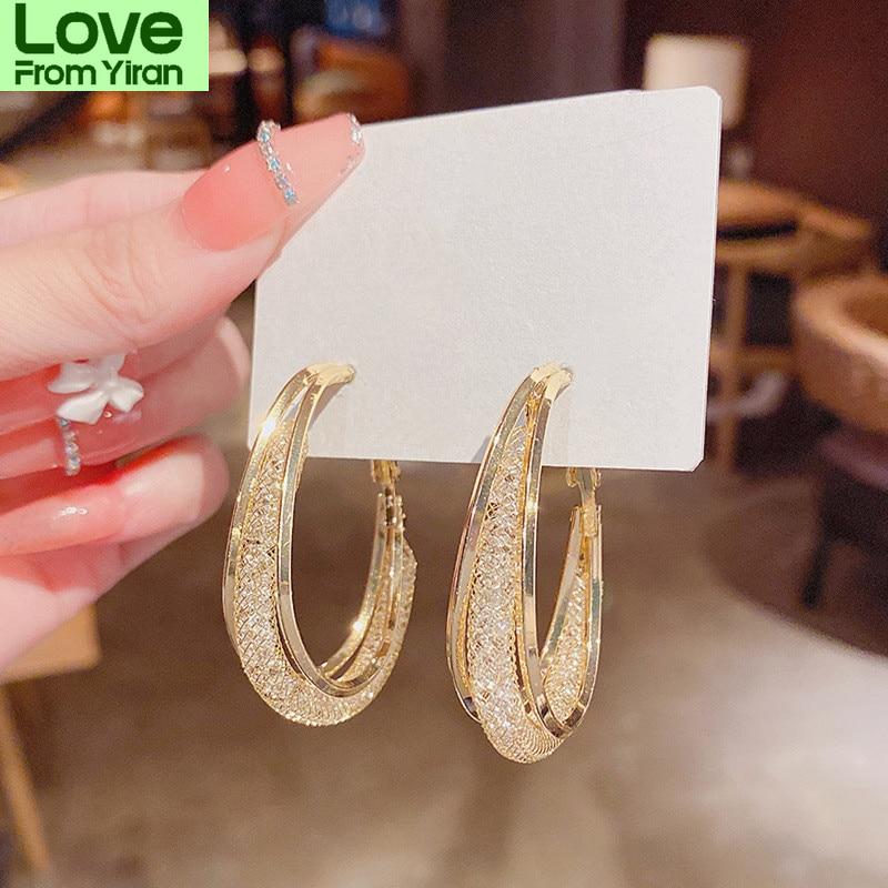 Модные очаровательные круглые металлические серьги для женщин, новые темпераментные подвески, оптовая продажа ювелирных изделий
Модные очаровательные круглые металлические серьги для женщин, новые темпераментные подвески, оптовая продажа ювелирных изделий