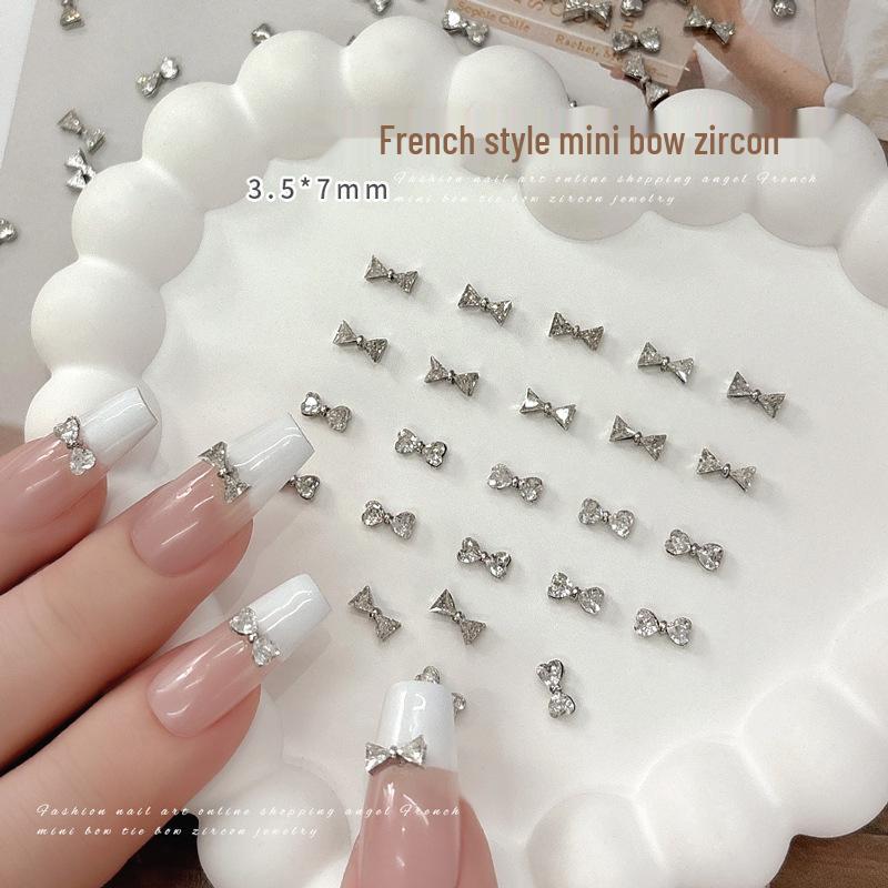French Mini Zircon Bow Nail Art Rhinestones - 3D Shiny Silver Bow Tie, Trendy Style
French Mini Zircon Bow Nail Art Rhinestones - 3D Shiny Silver Bow Tie, Trendy Style
