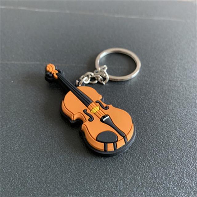 New Arrival Guitar Keychain Man Women Punk Violin Musical Instrument Silicone Pendant Keyring Holder Friends Gifts Bag Jewelry
New Arrival Guitar Keychain Man Women Punk Violin Musical Instrument Silicone Pendant Keyring Holder Friends Gifts Bag Jewelry