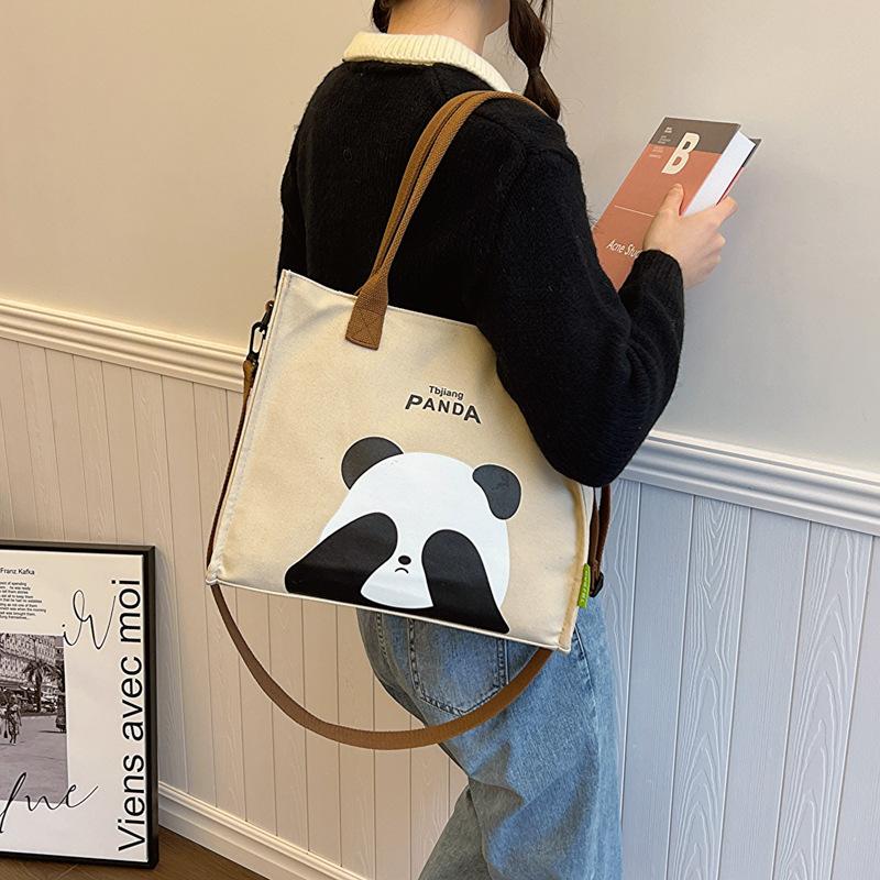 Cute panda printed shoulder bag female cartoon large capacity tote bag student handbag leisure bag хакі
Cute panda printed shoulder bag female cartoon large capacity tote bag student handbag leisure bag хакі