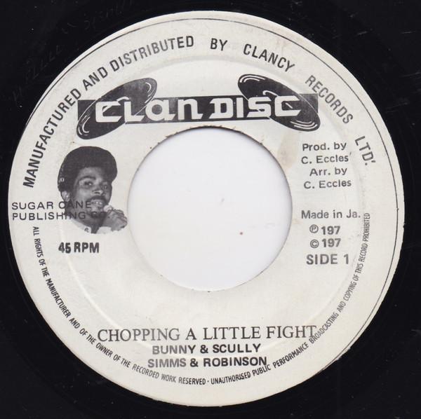 7inch Record BUNNY & SCULLY - Chopping A Little Fight NONE Clan Disc Jamaica Reggae, Ska & Dub Used
7inch Record BUNNY & SCULLY - Chopping A Little Fight NONE Clan Disc Jamaica Reggae, Ska & Dub Used